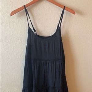 Flowy summer dress with tassel hem